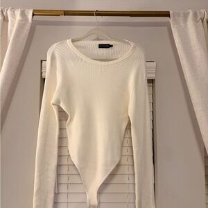 PrettyLittleThing Cream Ribbed Crew Neck Bodysuit